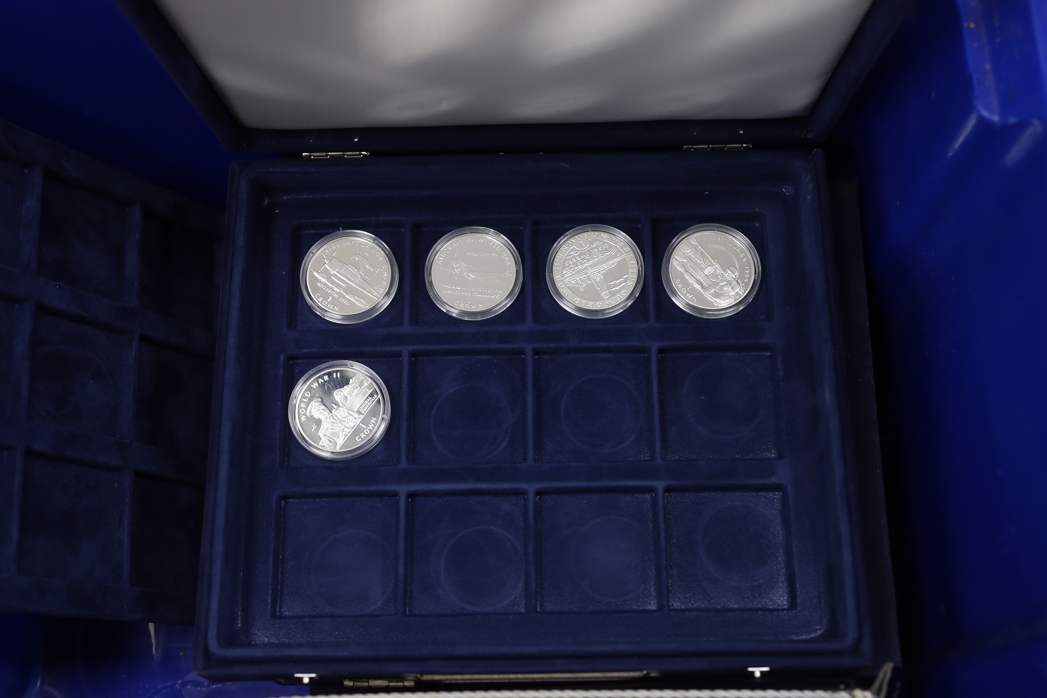 MDM Crown collections, 29 QEII proof silver commemorative crowns, Isle of Man, Gibraltar, Guernsey, Tuvalu etc., End of World War II, ships and explorers, and HM Queen Mother, three cases